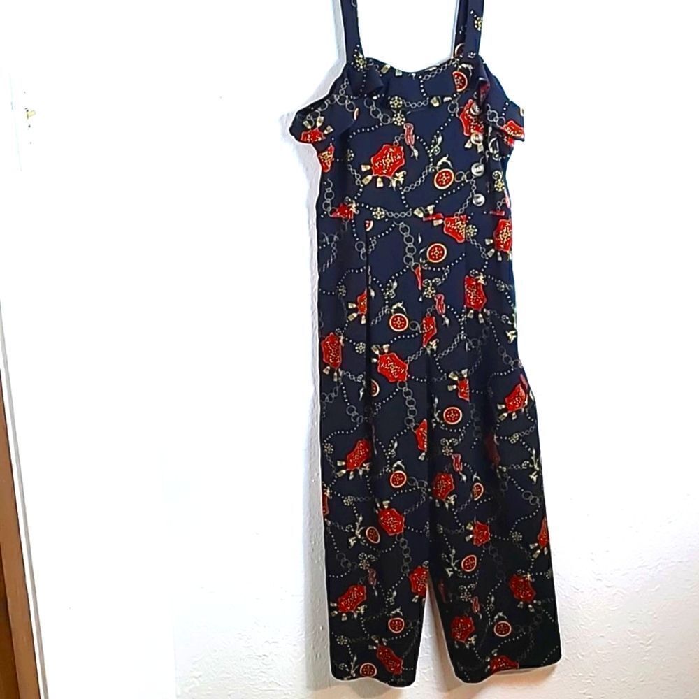 Speechless Jumpsuit, Black with Red & Gold Print, Ruffle Neckline, Size Medium